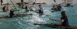Canoe Polo players in the pool